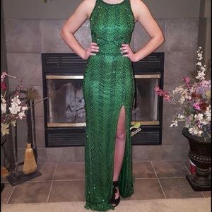 Filled beaded emerald green prom dress